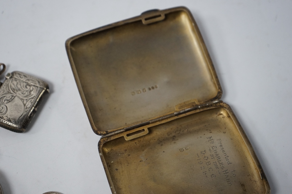 A set of six modern silver teaspoons, by United Cutlers Ltd, Sheffield, 1995, together with an earlier silver cigarette case and silver vesta case and two silver open faced pocket watches including J.W. Benson. Condition